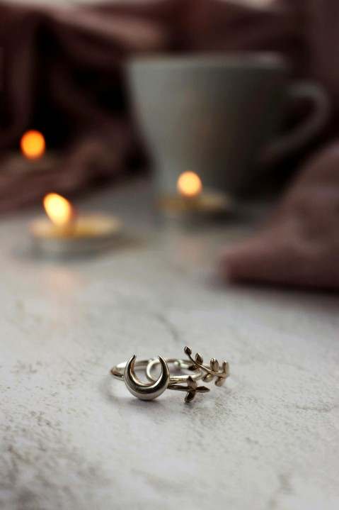 Polished recycled platinum ring on dark background